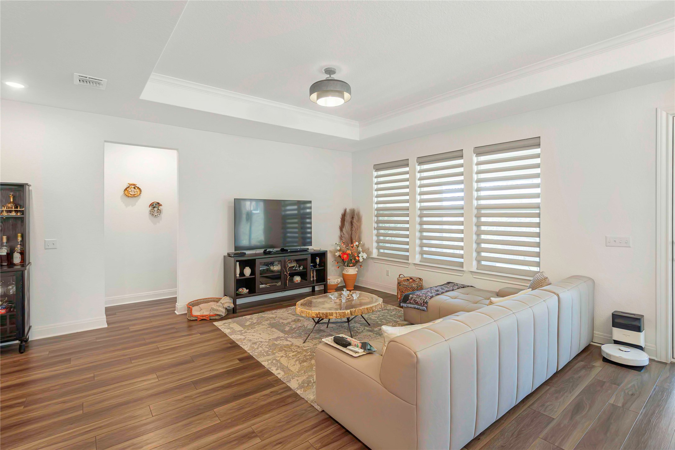 126 Lafayette Street Georgetown, TX 78633 - Photo 11 of 30 a spacious bedroom with a bed and a flat screen tv