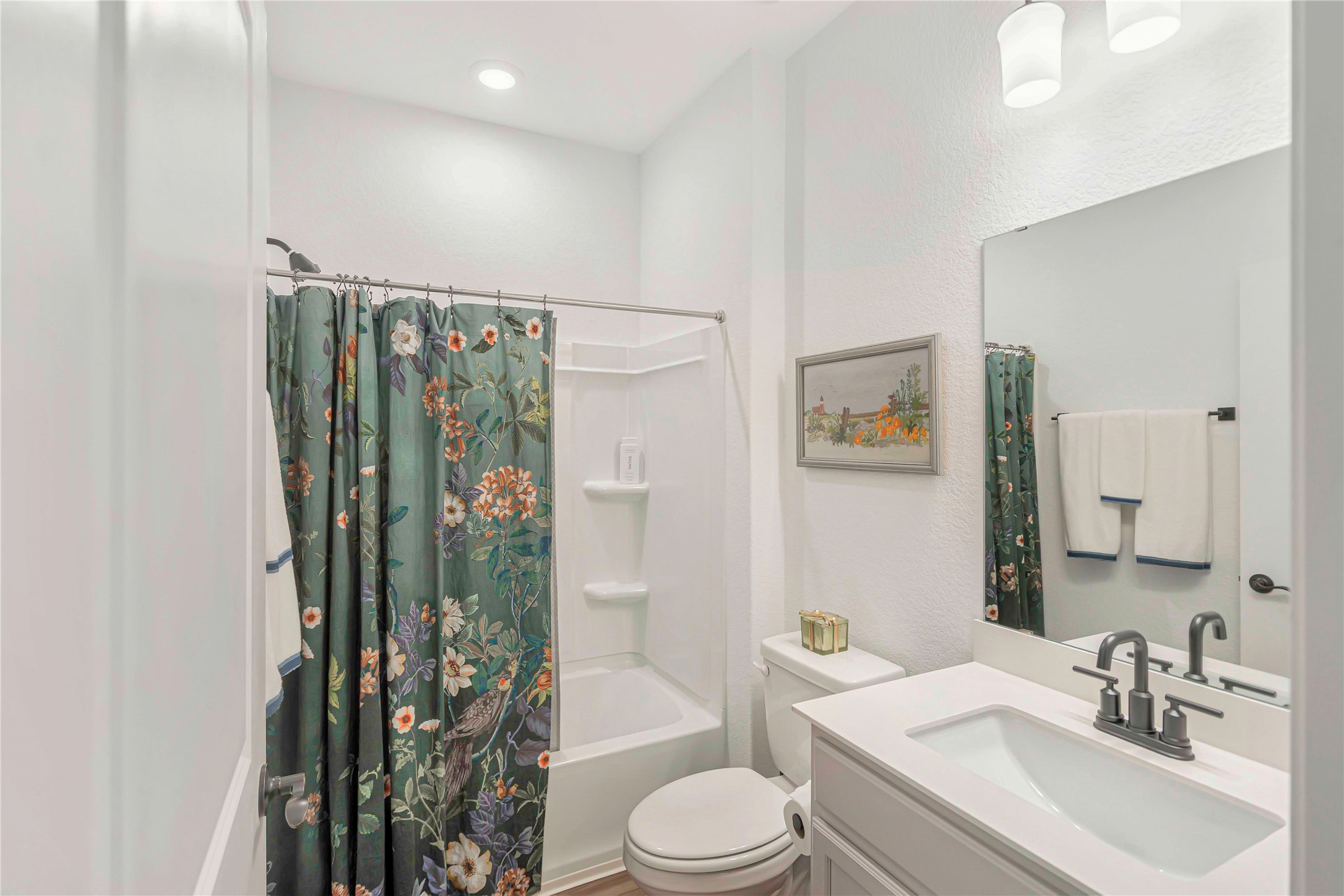 126 Lafayette Street Georgetown, TX 78633 - Photo 20 of 30 a bathroom with a sink toilet and shower