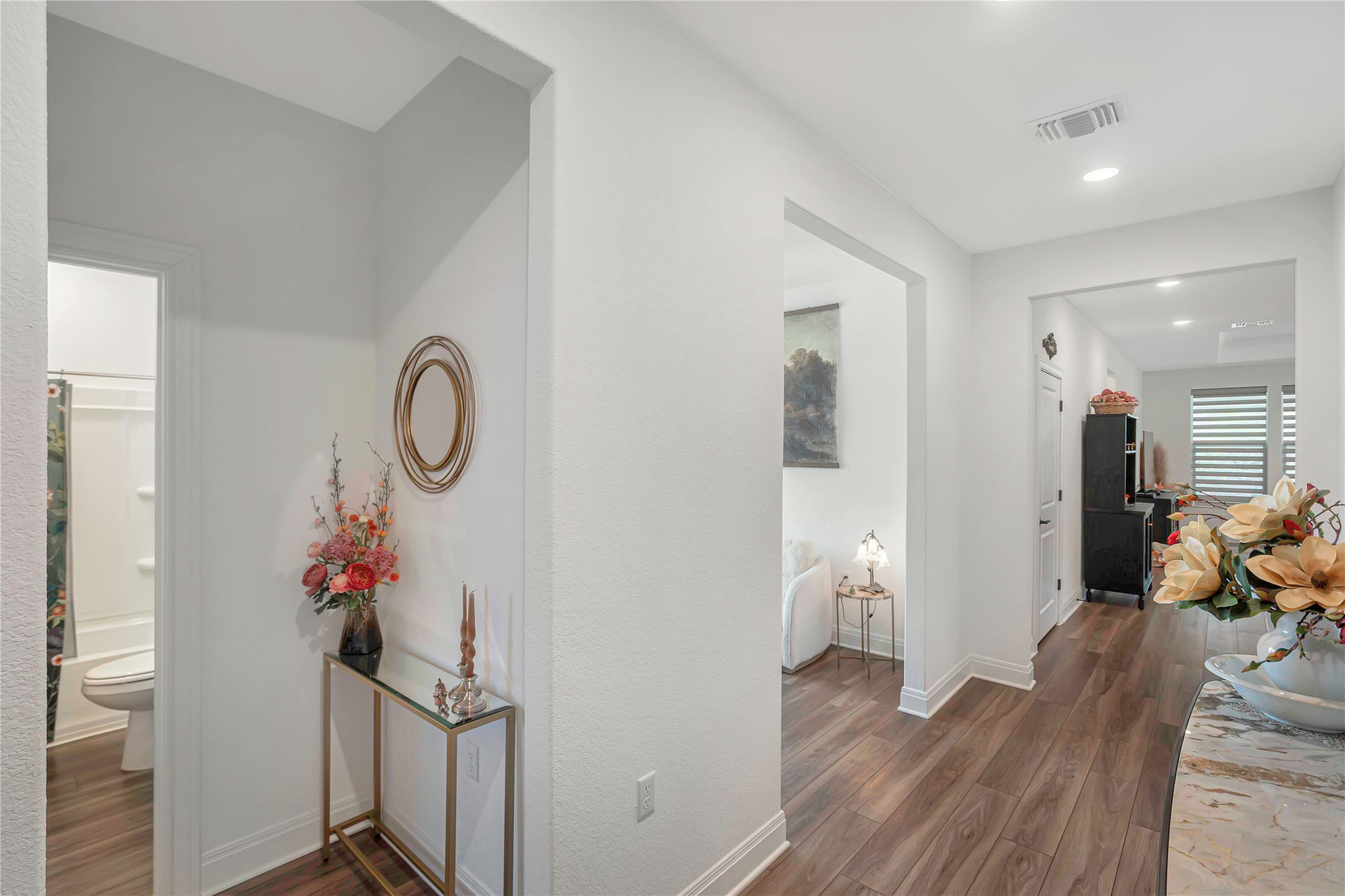 126 Lafayette Street Georgetown, TX 78633 - Photo 5 of 30 a very nice looking room with wooden floor and stairs