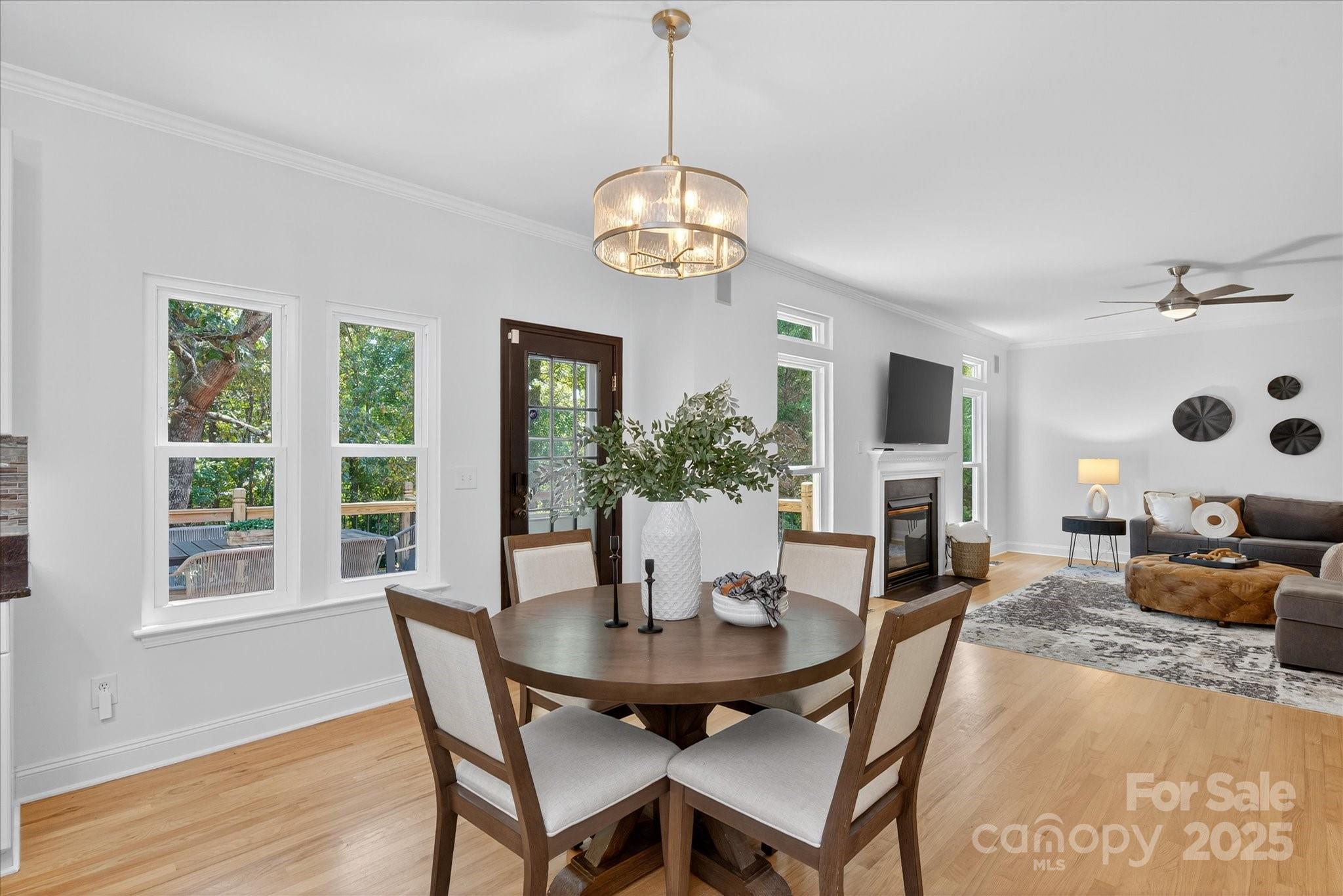 209 Whitegrove Drive Fort Mill, SC 29715 - Photo 13 of 48 a view of a dining room with furniture window and wooden floor