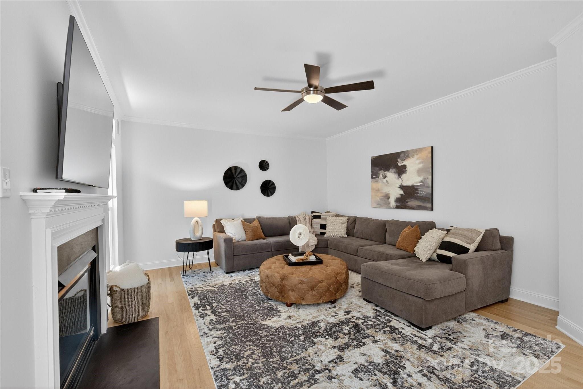 209 Whitegrove Drive Fort Mill, SC 29715 - Photo 20 of 48 a living room with furniture and a fireplace