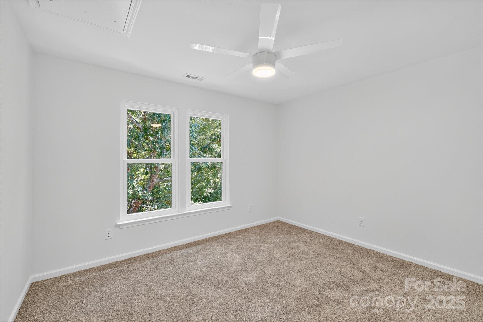 209 Whitegrove Drive Fort Mill, SC 29715 - Photo 28 of 48 an empty room with windows