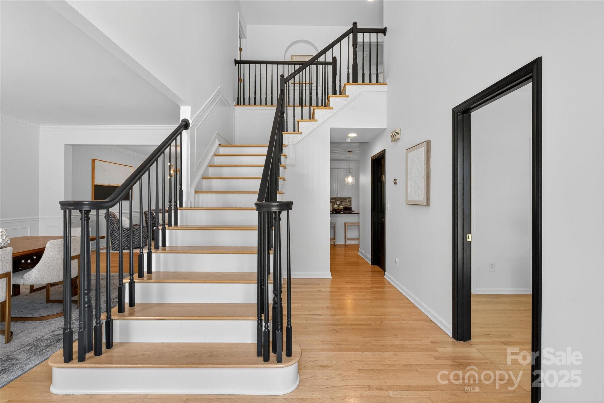 209 Whitegrove Drive Fort Mill, SC 29715 - Photo 3 of 48 a view of entryway and hall with wooden floor