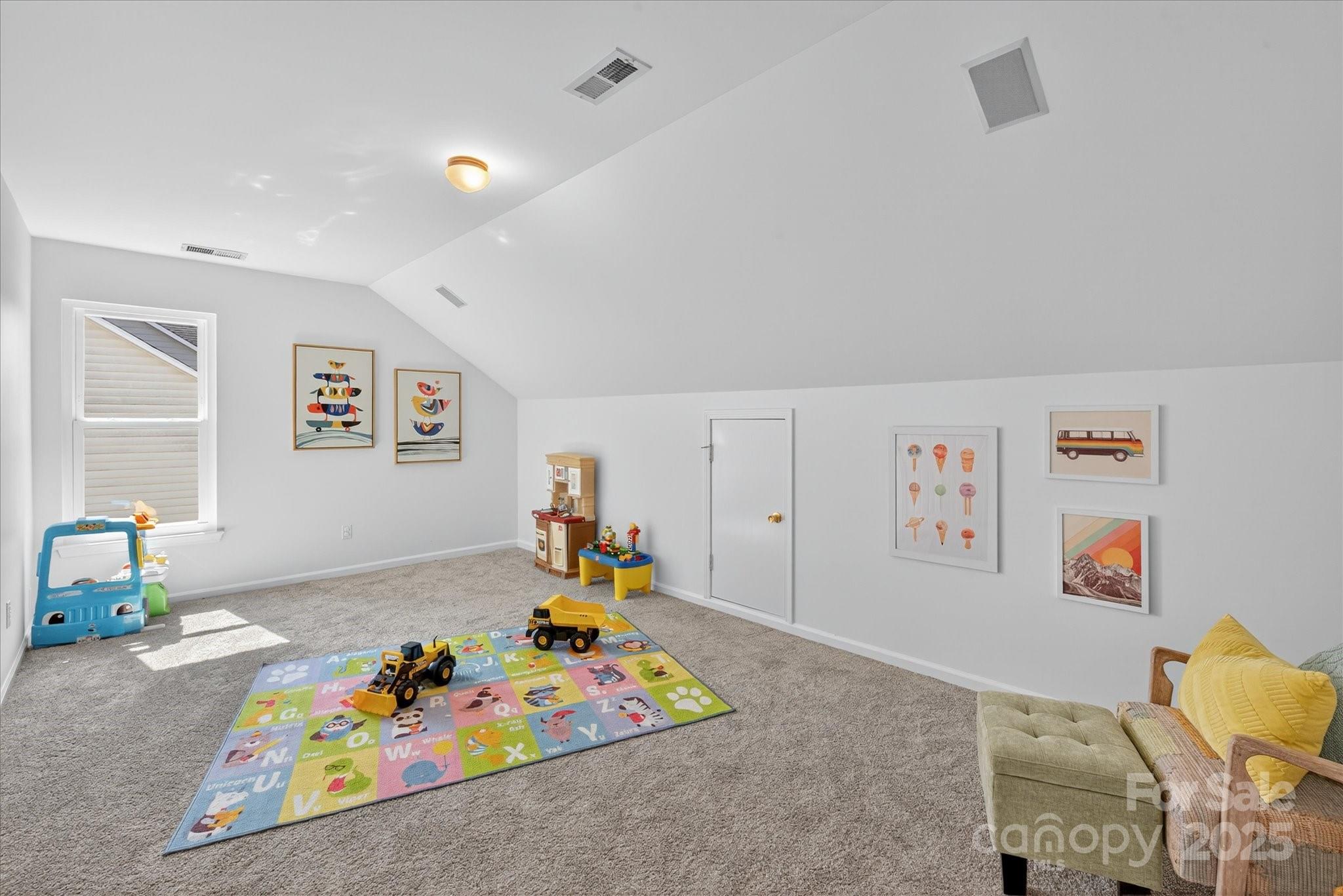 209 Whitegrove Drive Fort Mill, SC 29715 - Photo 31 of 48 a bedroom with furniture and a couch