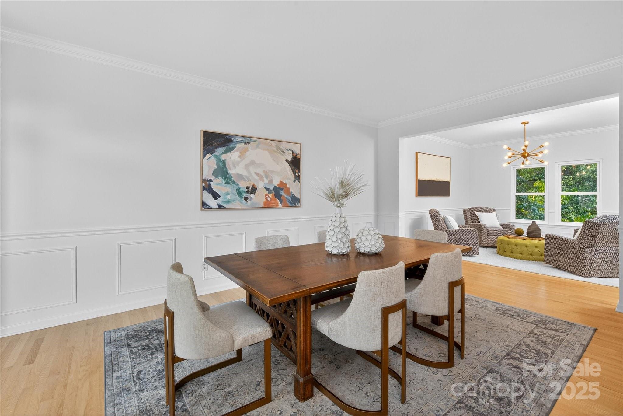 209 Whitegrove Drive Fort Mill, SC 29715 - Photo 6 of 48 a view of a dining room with furniture a rug and wooden floor