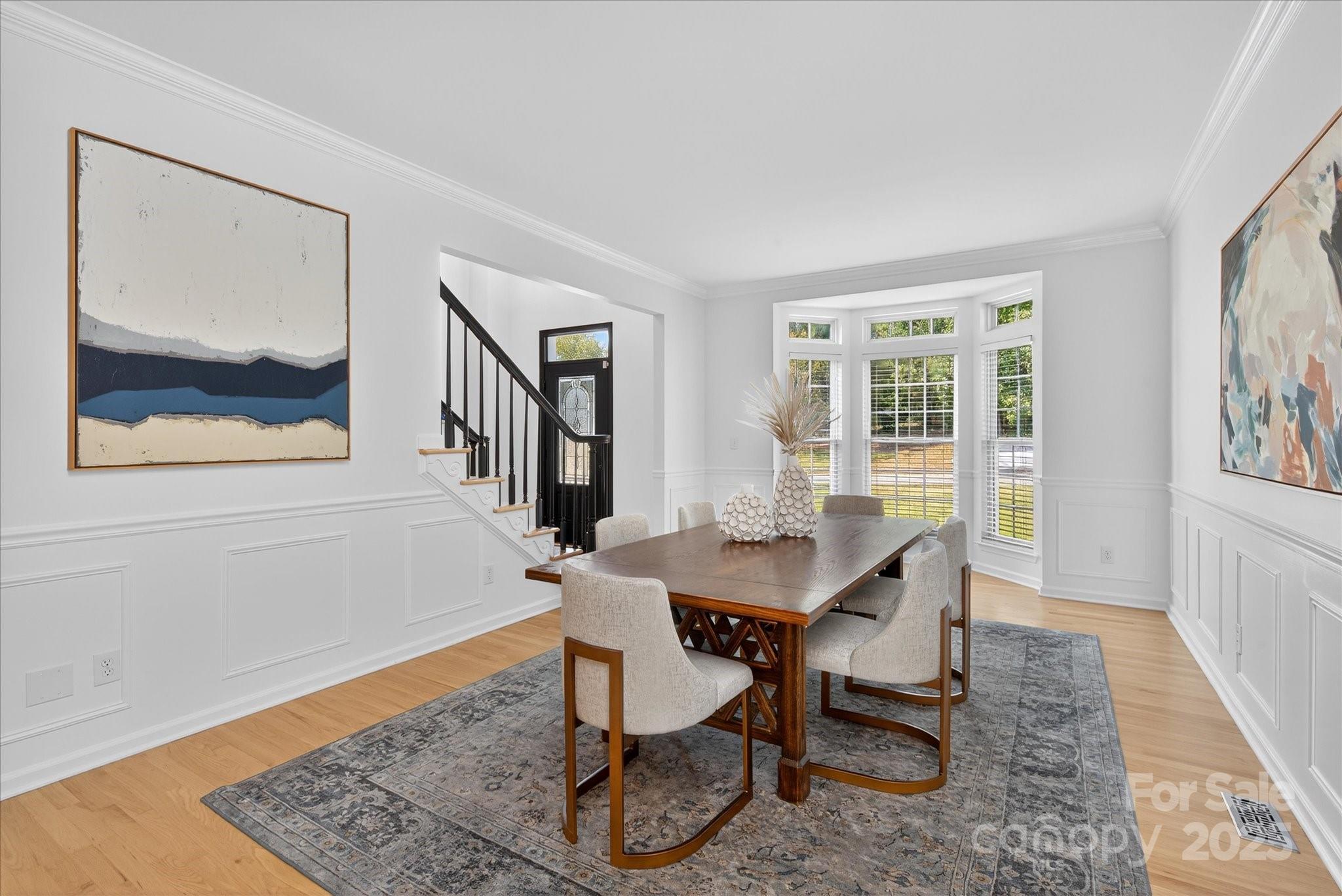 209 Whitegrove Drive Fort Mill, SC 29715 - Photo 7 of 48 a view of a dining room with furniture window and wooden floor