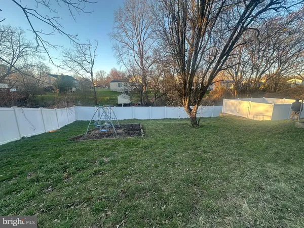 a view of garden with trees