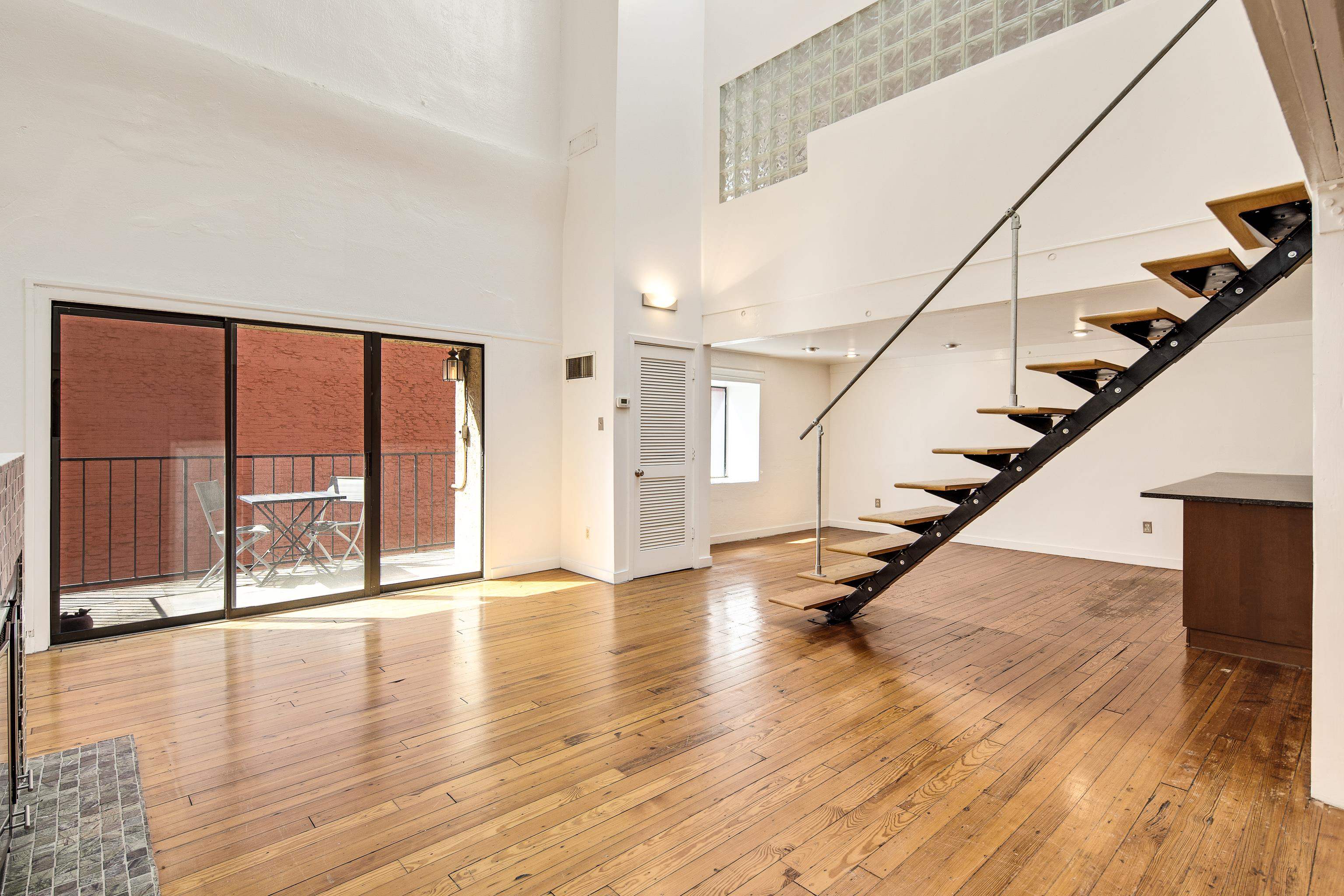 107 South Front Street, Unit 45 Memphis, TN 38103 - Photo 26 of 40 a view of an entryway with wooden floor and fence