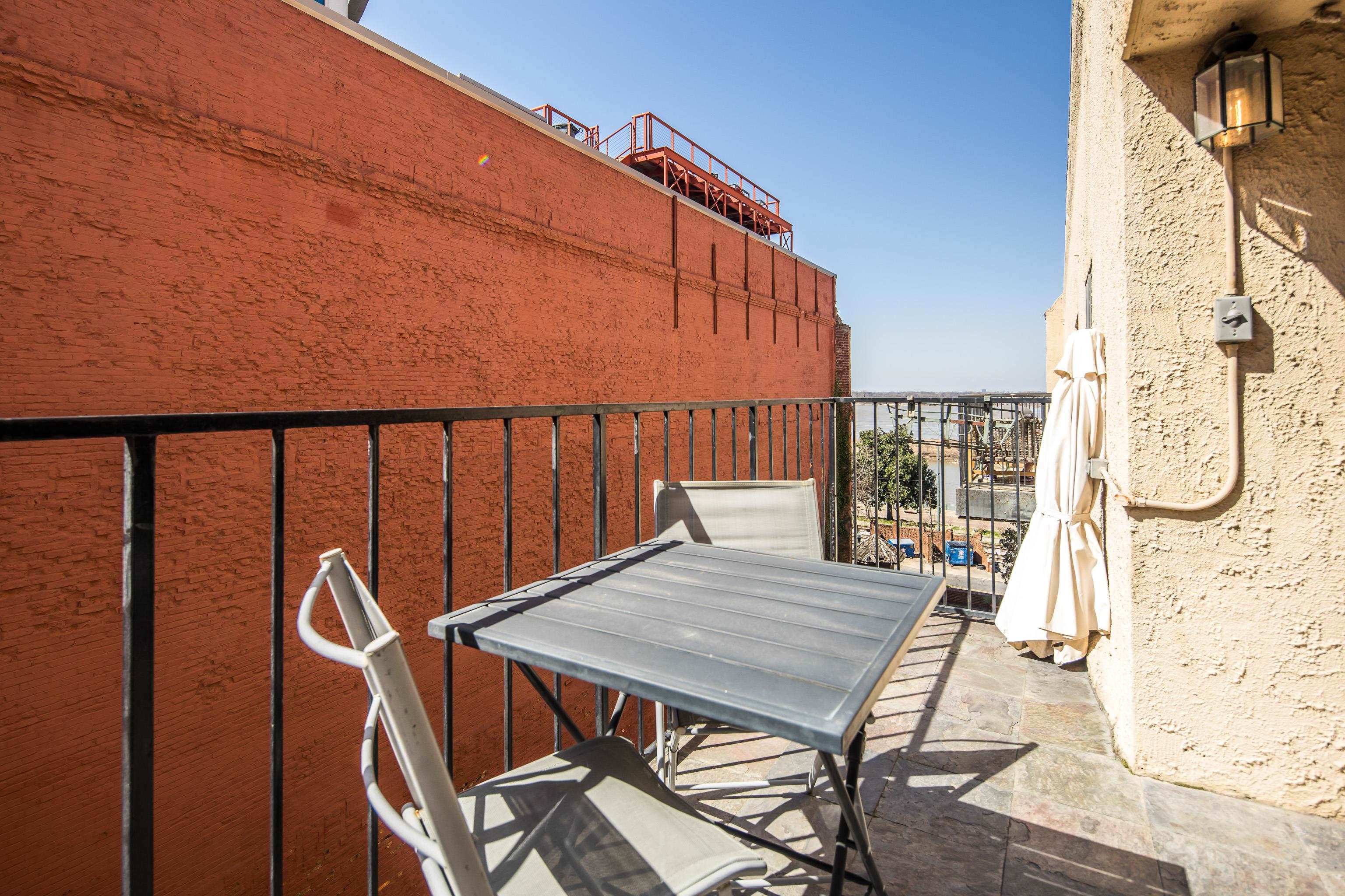 107 South Front Street, Unit 45 Memphis, TN 38103 - Photo 34 of 40 a view of balcony with wooden floor and outdoor seating