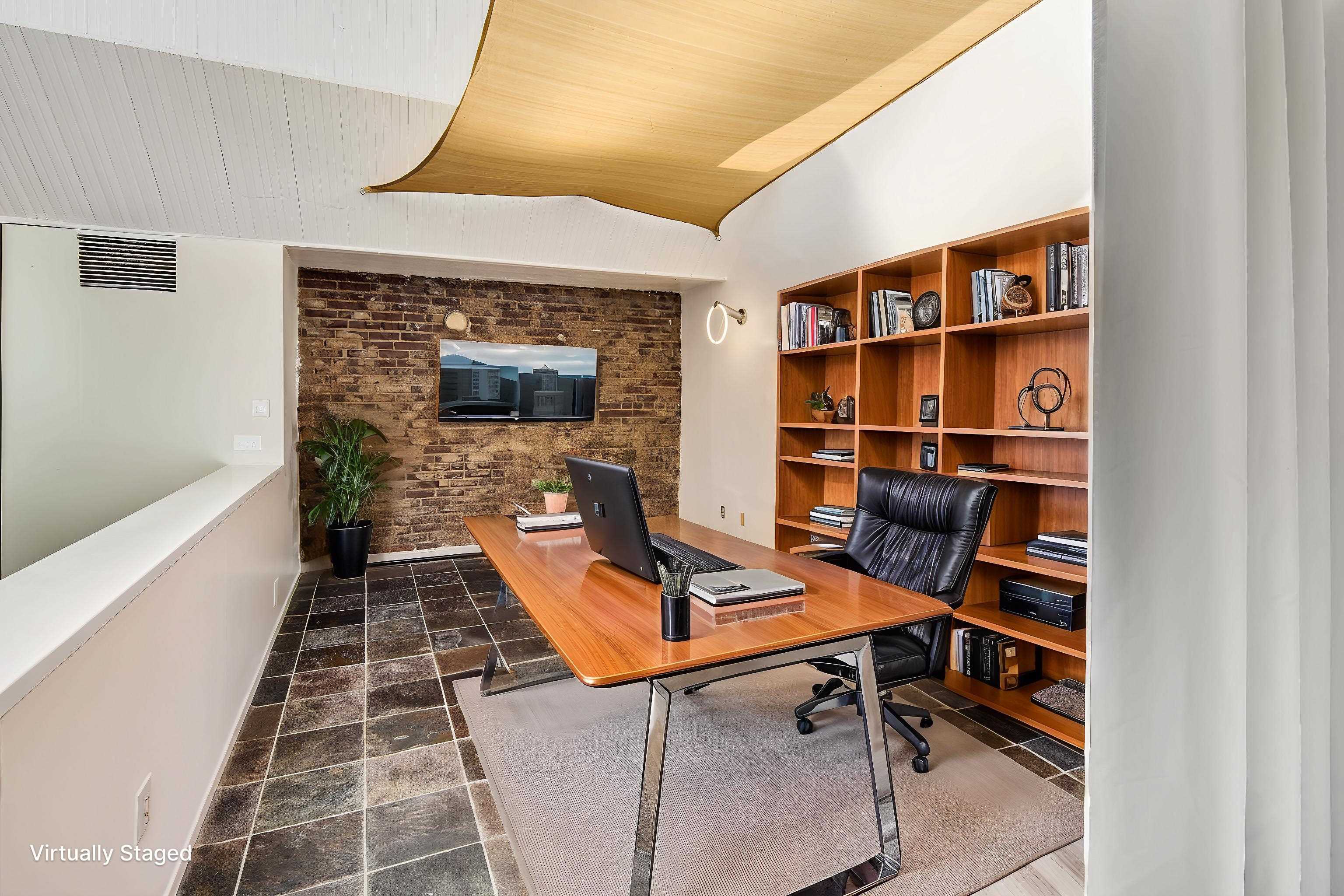 107 South Front Street, Unit 45 Memphis, TN 38103 - Photo 5 of 40 a view of a workspace with furniture