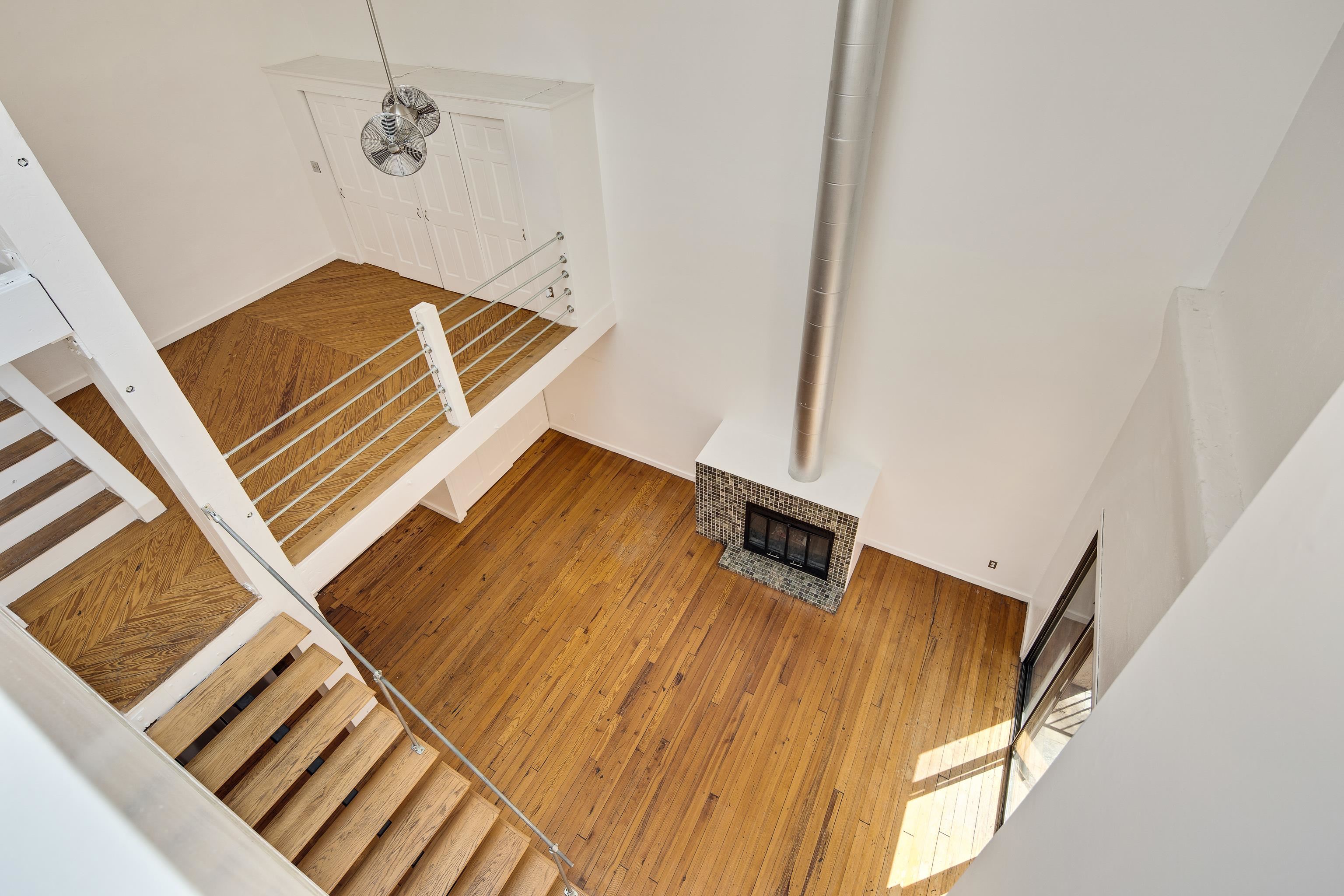 107 South Front Street, Unit 45 Memphis, TN 38103 - Photo 10 of 40 a view of a room with wooden floor