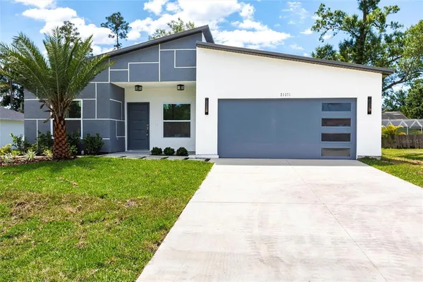 a front view of house with yard