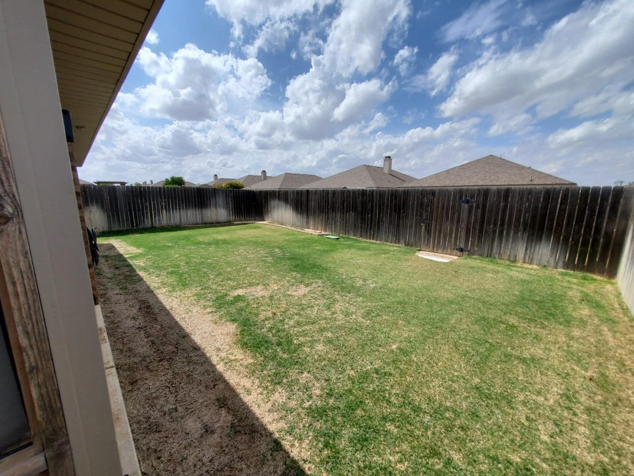 5602 111th Street Lubbock, TX 79424 - Photo 13 of 13 a view of swimming pool from a yard