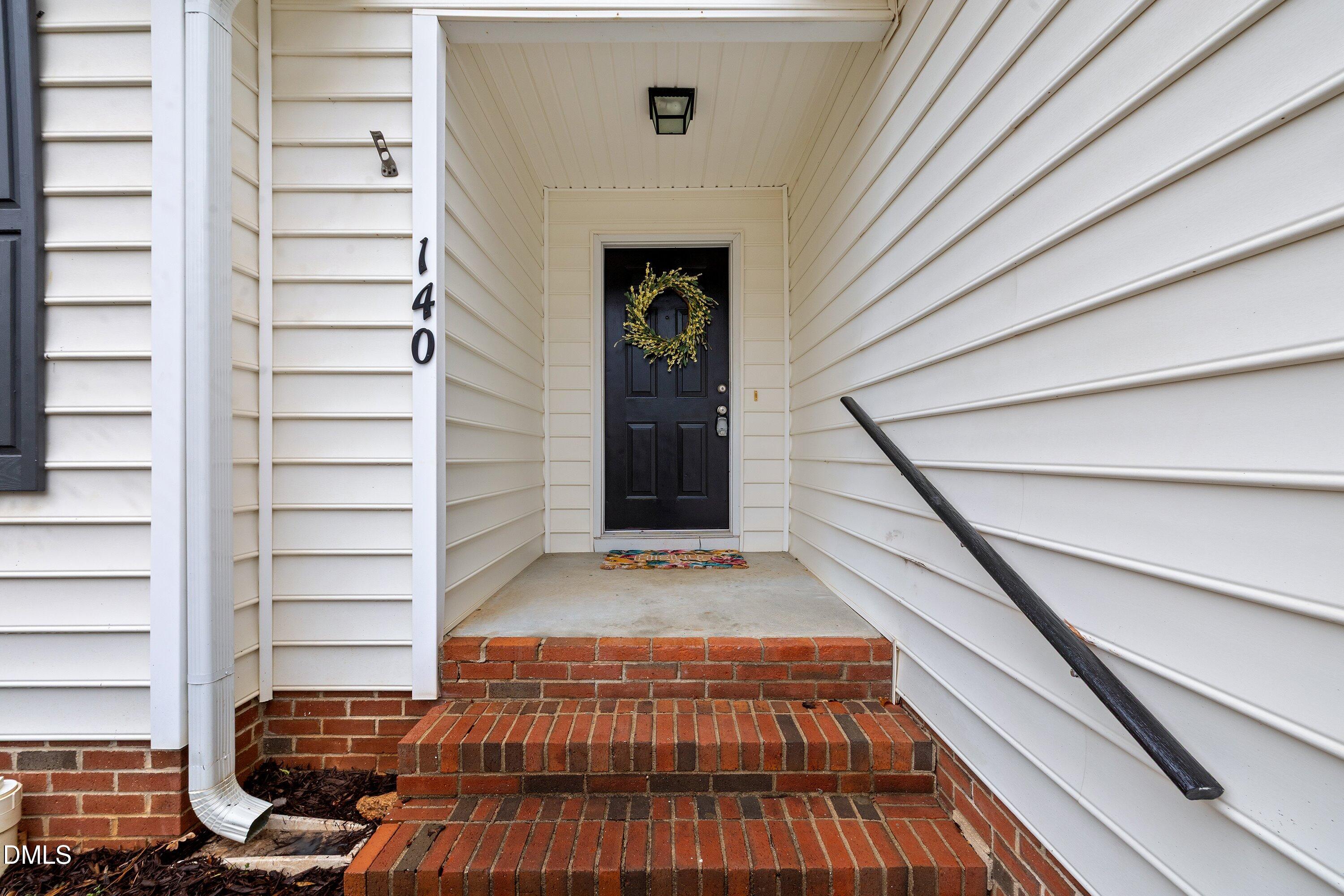 140 Melksham Road Wake Forest, NC 27587 - Photo 31 of 34 a view of entryway with a front door