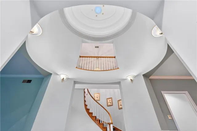 a view of hall way with furniture