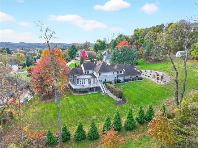 a view of a table and chairs in the garden