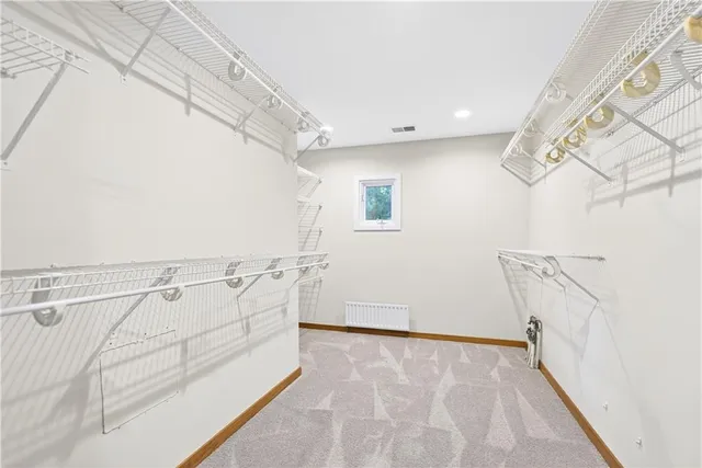 a view of a room with racks on the wall