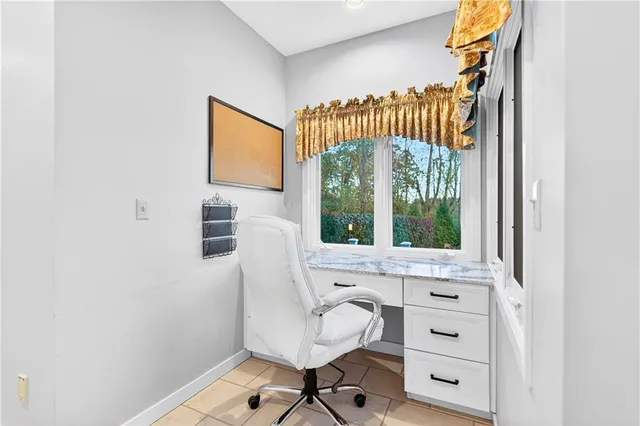 a view of a house with a yard deck and living room