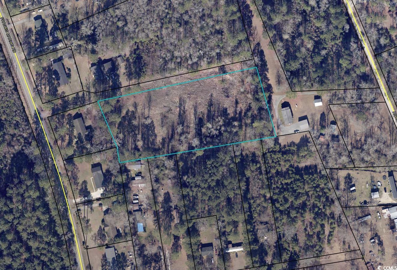 Aerial view of property's location with property parcel outlined