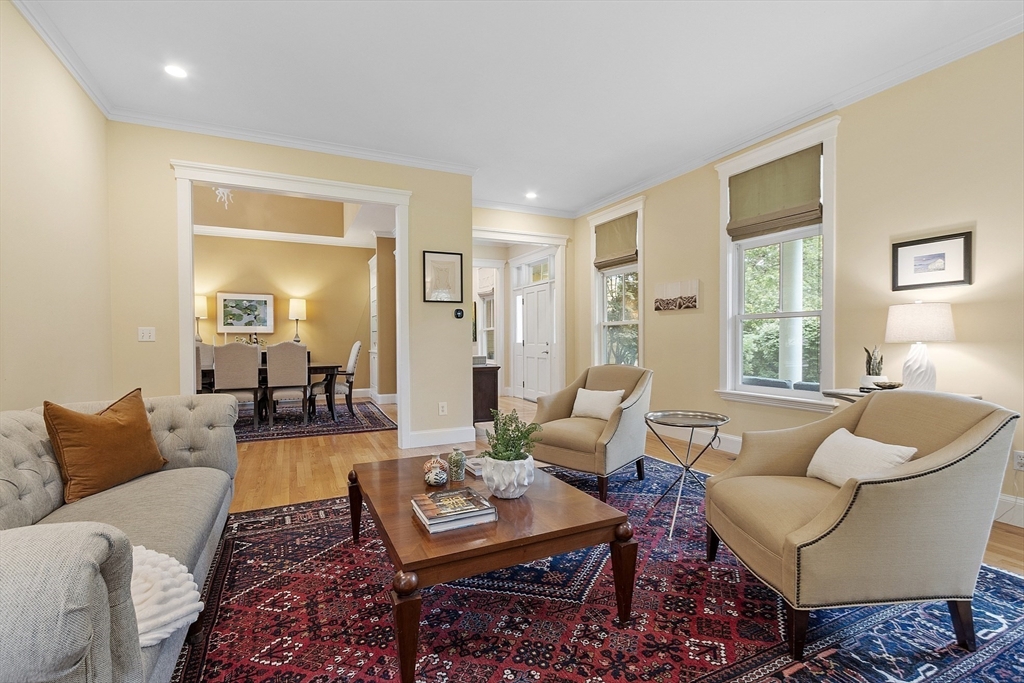 121 Concord Avenue Lexington, MA 02421 - Photo 12 of 42 a living room with furniture and a window