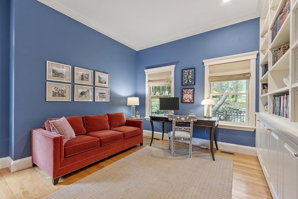 121 Concord Avenue Lexington, MA 02421 - Photo 13 of 42 a living room with furniture and a large window