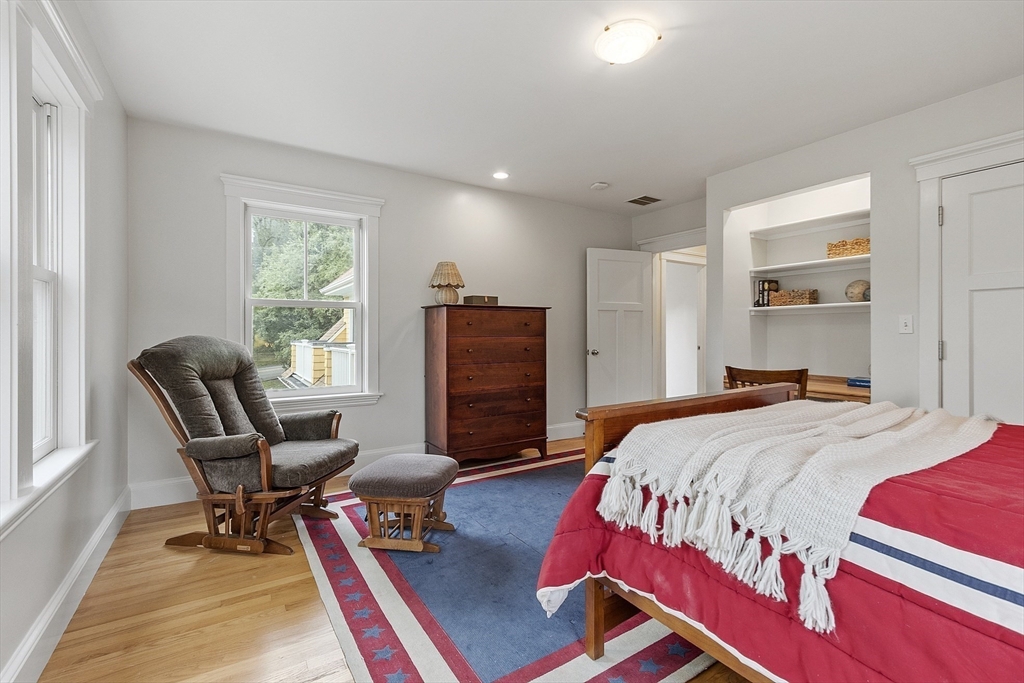 121 Concord Avenue Lexington, MA 02421 - Photo 21 of 42 a bedroom with a bed and a window