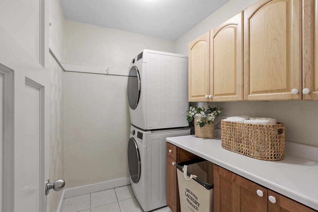 121 Concord Avenue Lexington, MA 02421 - Photo 28 of 42 a utility room with shower and mirror