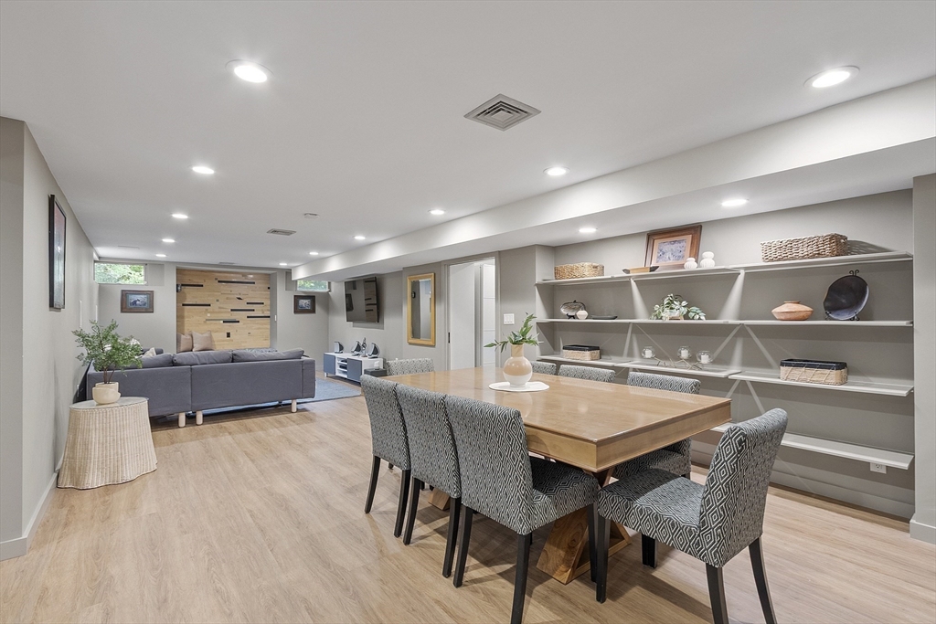 121 Concord Avenue Lexington, MA 02421 - Photo 32 of 42 a dining room with furniture and wooden floor