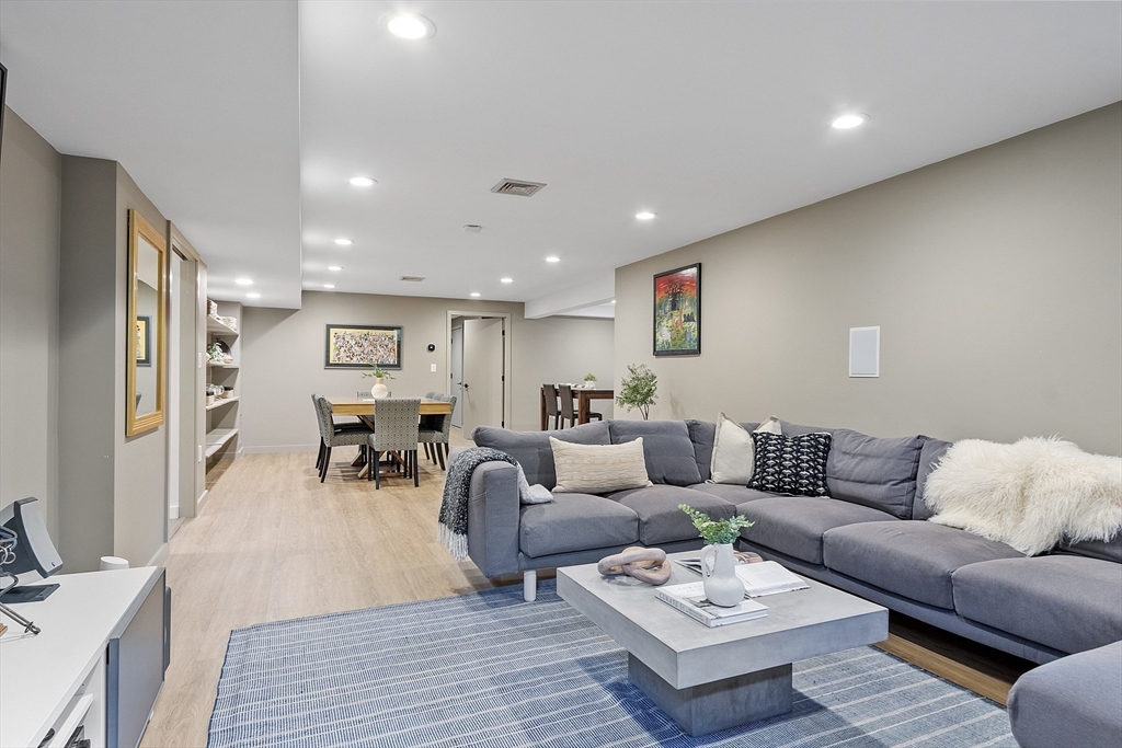 121 Concord Avenue Lexington, MA 02421 - Photo 33 of 42 a living room with furniture and wooden floor