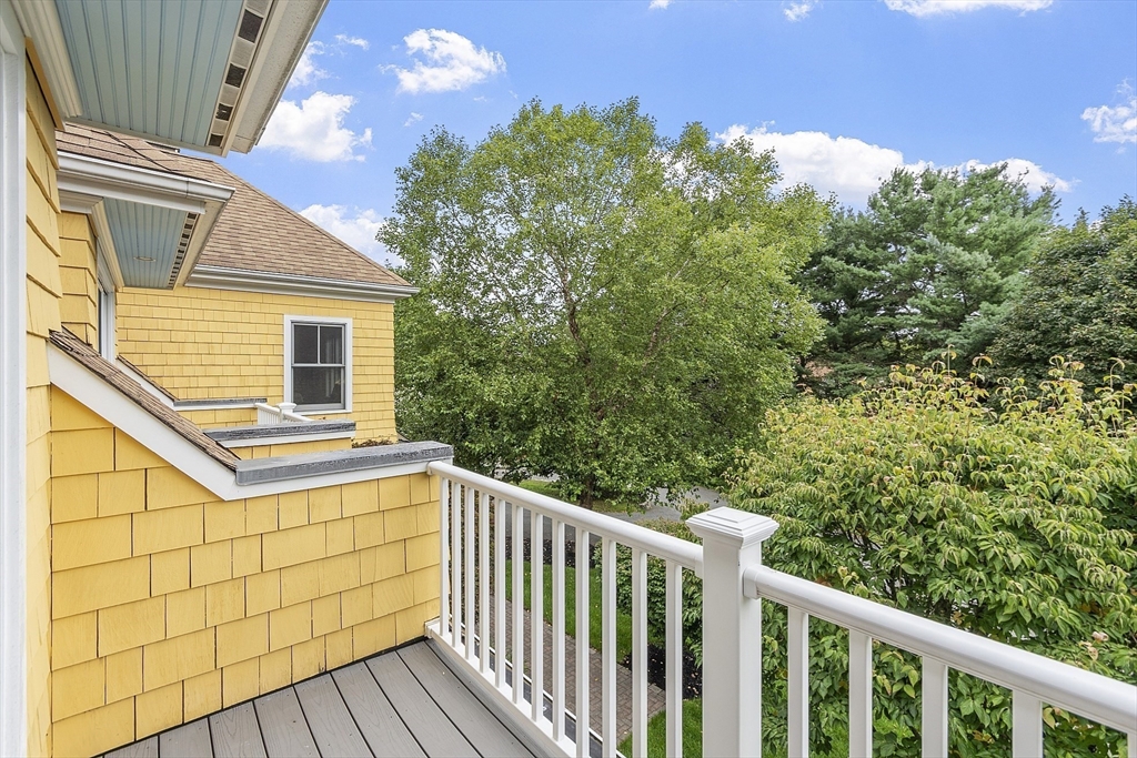 121 Concord Avenue Lexington, MA 02421 - Photo 37 of 42 a view of a balcony with wooden fence and floor