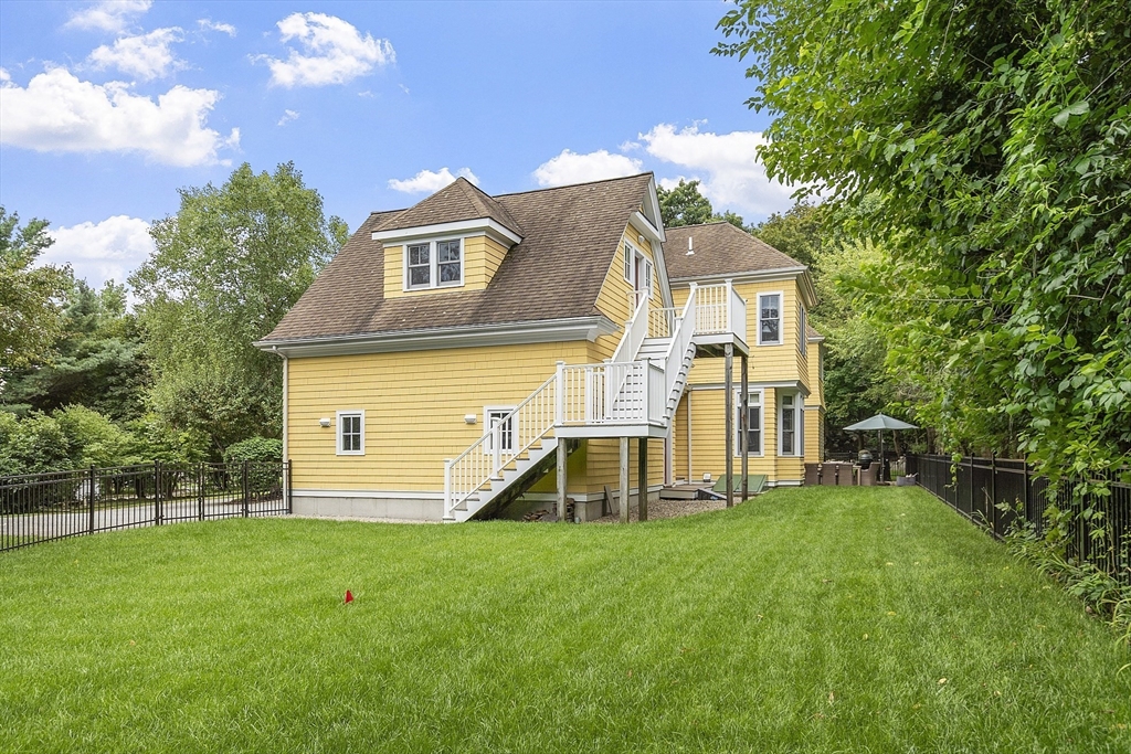 121 Concord Avenue Lexington, MA 02421 - Photo 38 of 42 a view of a house with a yard