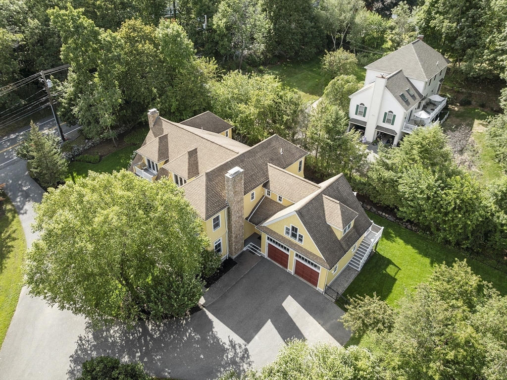 121 Concord Avenue Lexington, MA 02421 - Photo 41 of 42 an aerial view of a house with a garden