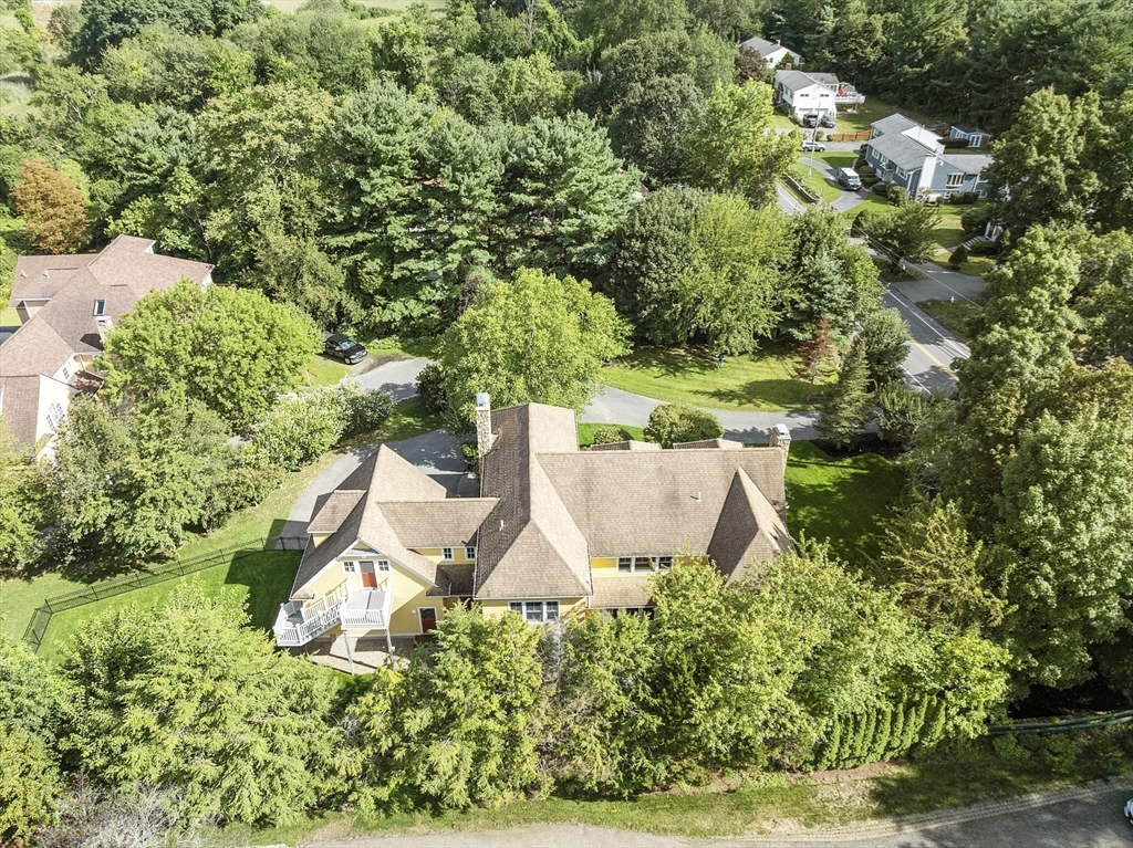 121 Concord Avenue Lexington, MA 02421 - Photo 42 of 42 an aerial view of a house with yard and outdoor seating