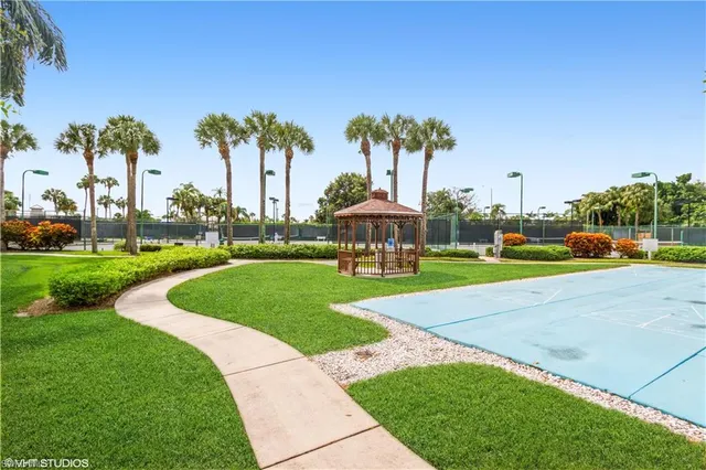 a view of a swimming pool with a lounge chairs