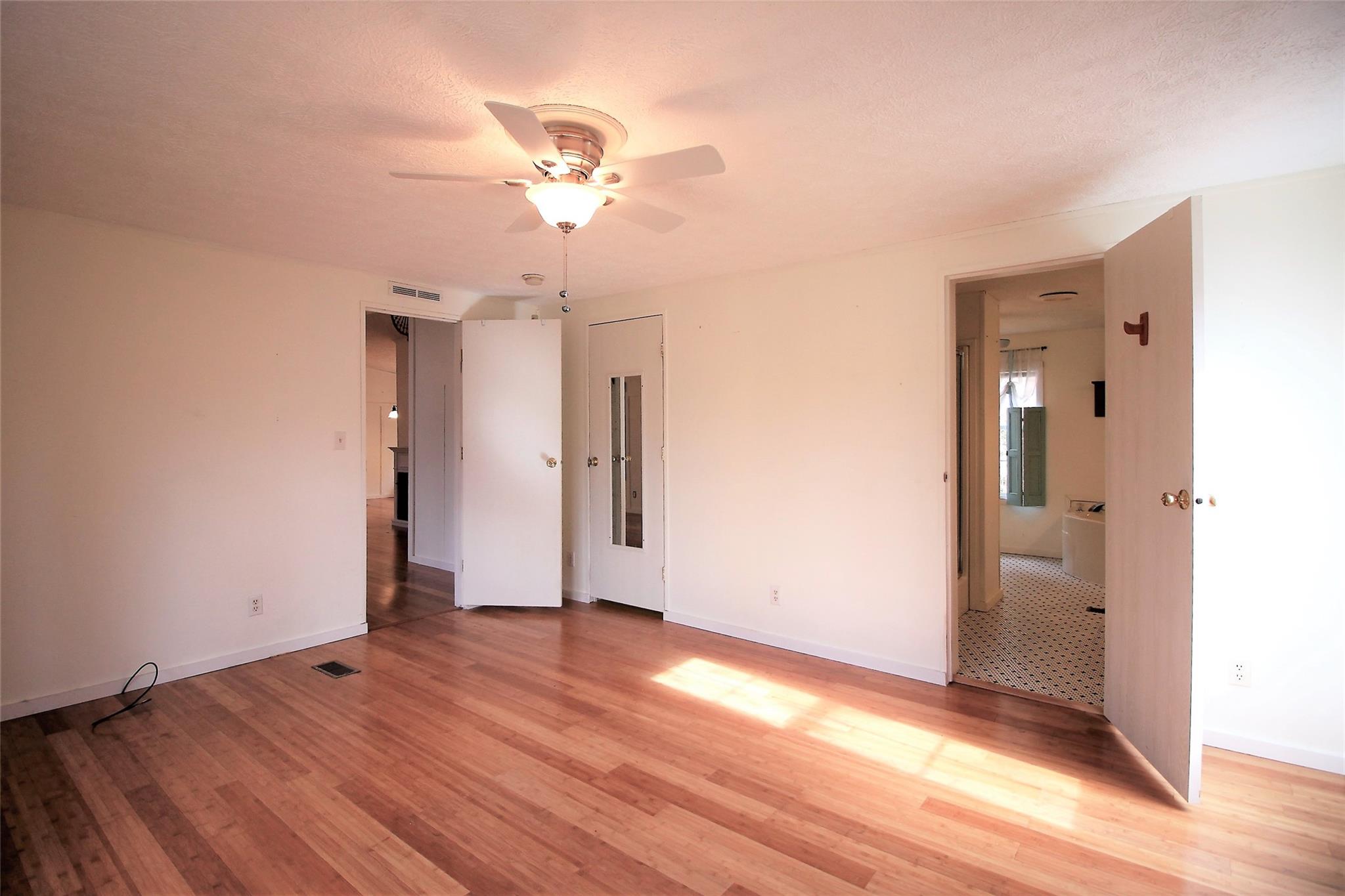 2 Whisper Street Clyde, NC 28721 - Photo 23 of 44 a view of a room with wooden floor and closet
