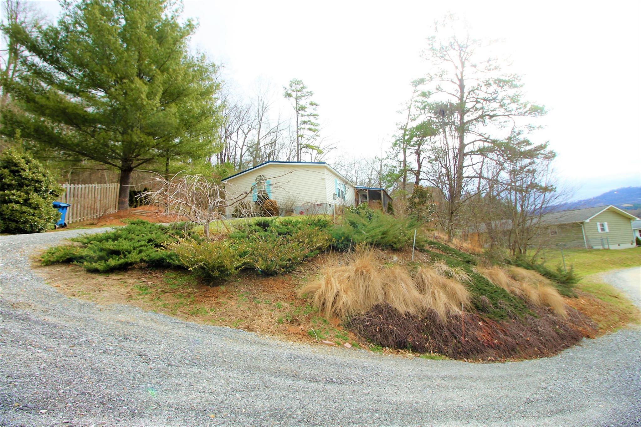 2 Whisper Street Clyde, NC 28721 - Photo 41 of 44 a view of a backyard of house