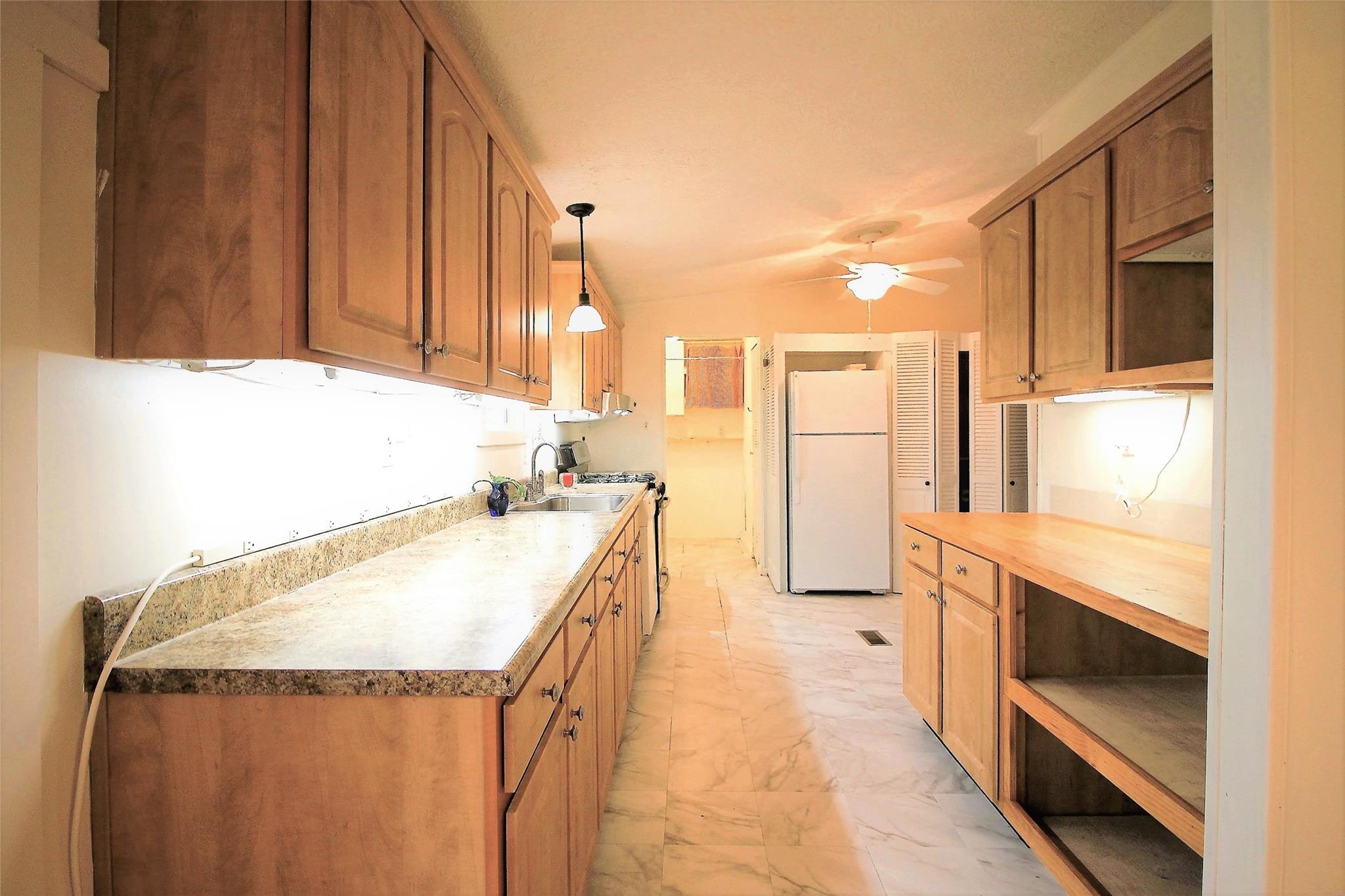 2 Whisper Street Clyde, NC 28721 - Photo 9 of 44 a spacious bathroom with a granite countertop sink and a bathtub