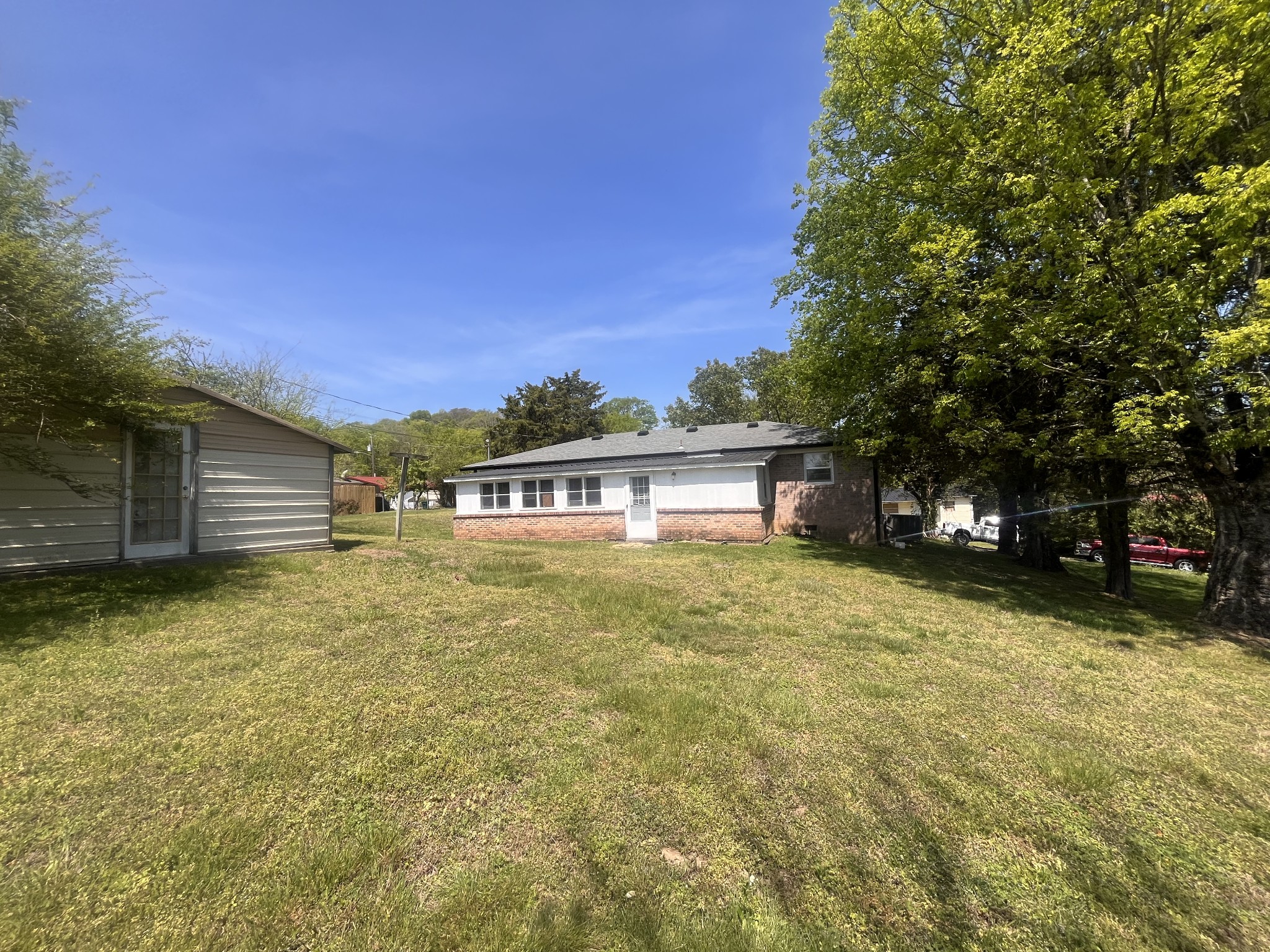 1035 North 3rd Street Pulaski, TN 38478 - Photo 17 of 17 a front view of a house with a yard