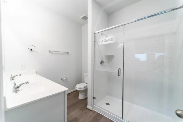 a bathroom with a sink and a shower