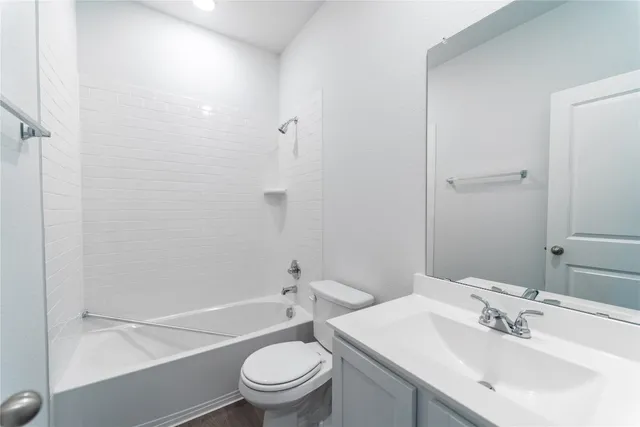 a bathroom with a sink toilet and a bathtub