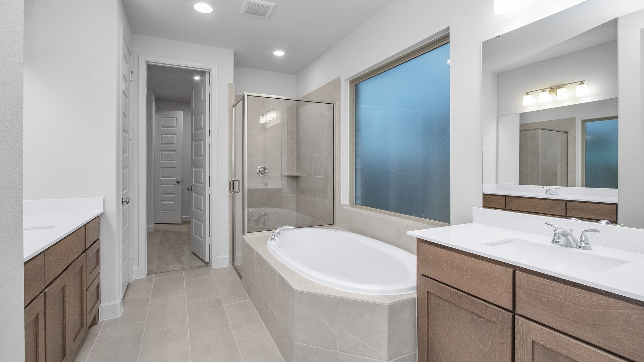 342 Prairie Warbler Street Magnolia, TX 77354 - Photo 13 of 24 a bathroom with a sink a toilet and shower