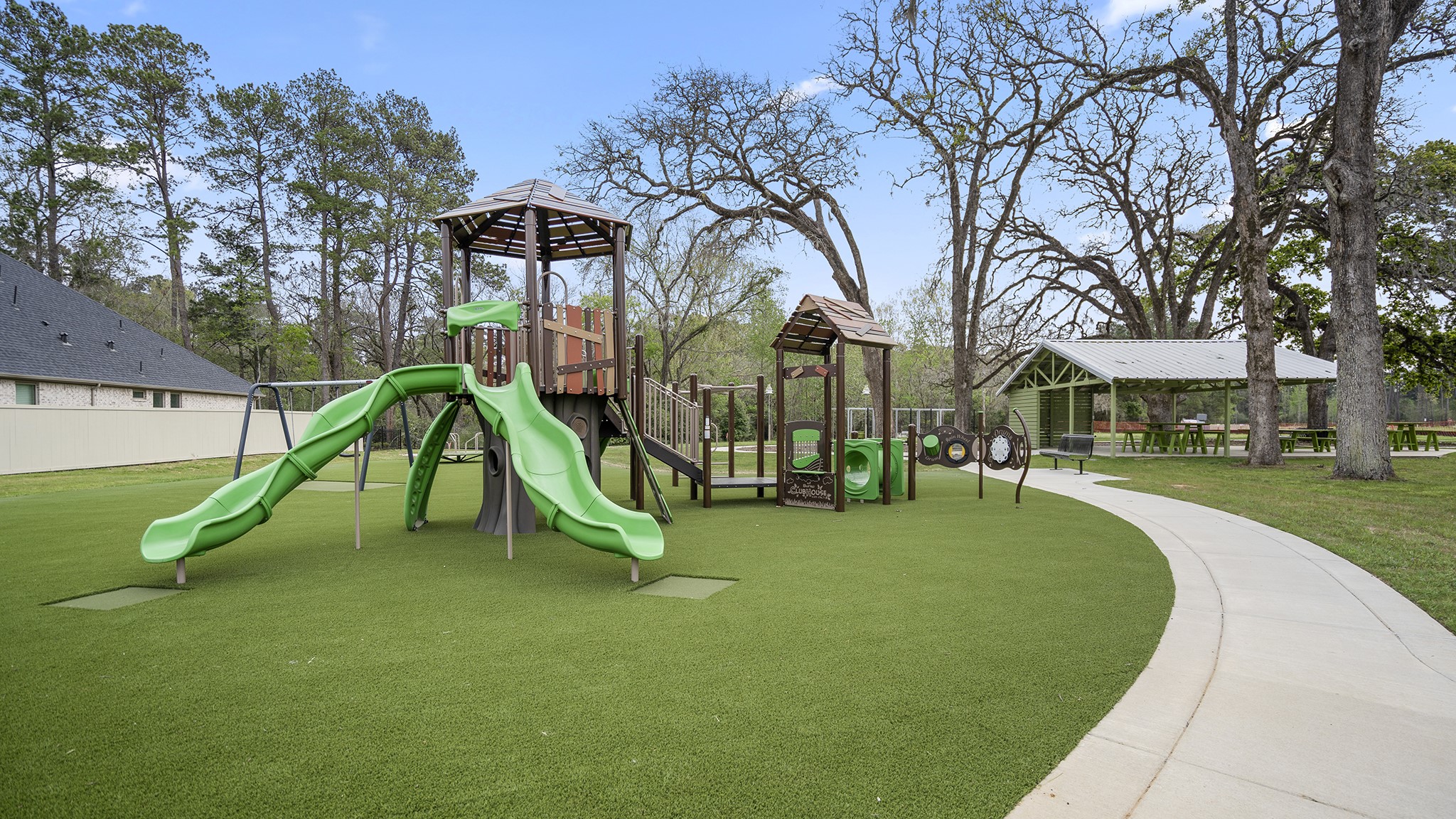 342 Prairie Warbler Street Magnolia, TX 77354 - Photo 23 of 24 a childrens park with lots of swings and slides