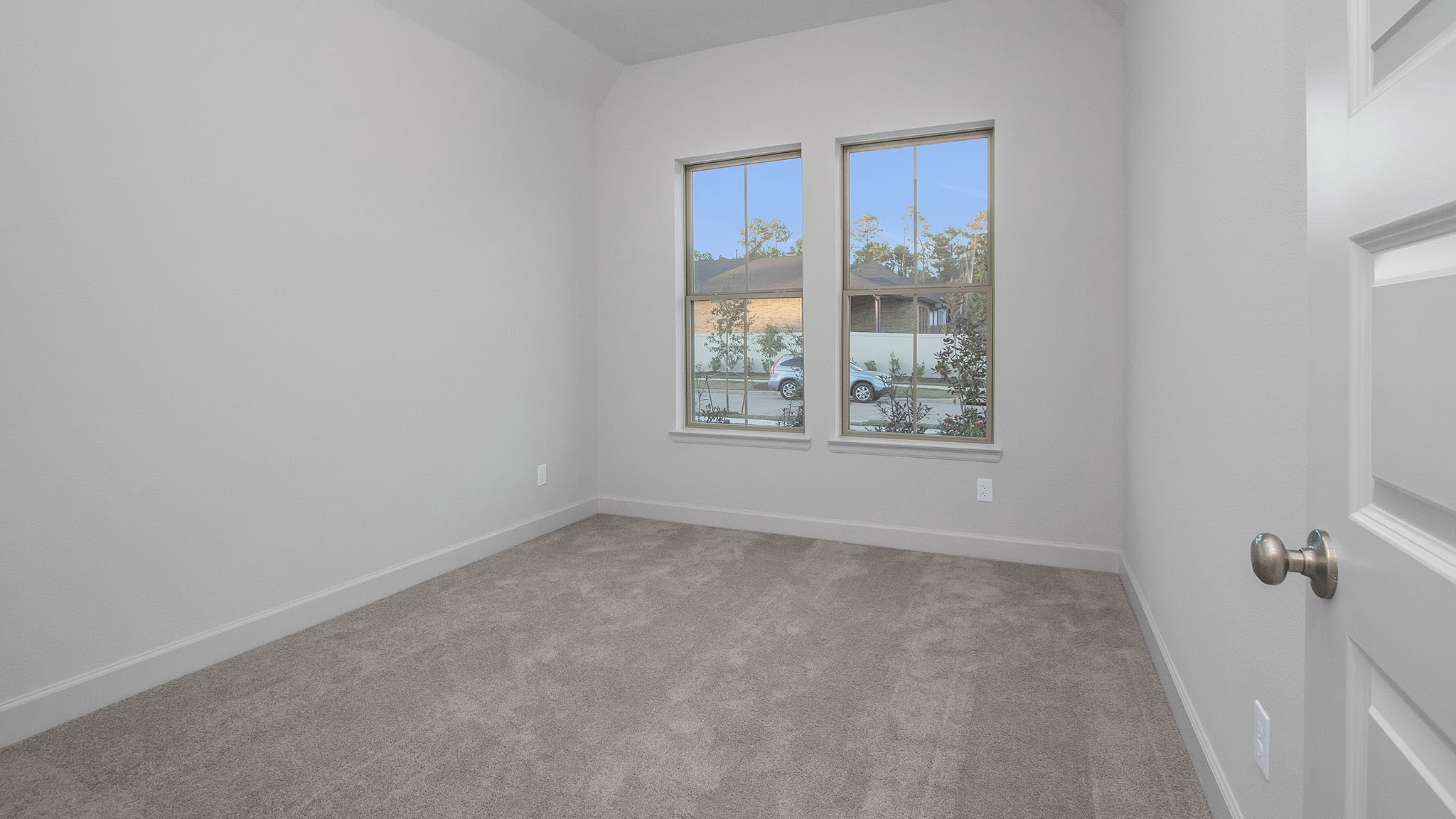 342 Prairie Warbler Street Magnolia, TX 77354 - Photo 8 of 24 a view of an empty room with a window