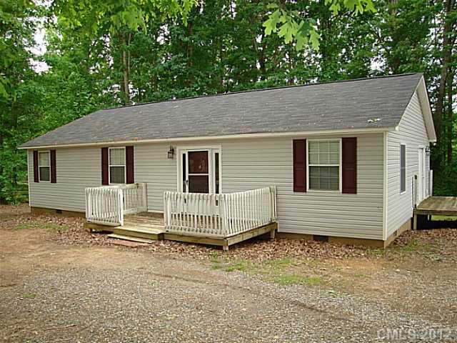 275 Frontier Road Clover, SC 29710 - Photo 1 of 12 a backyard of a house