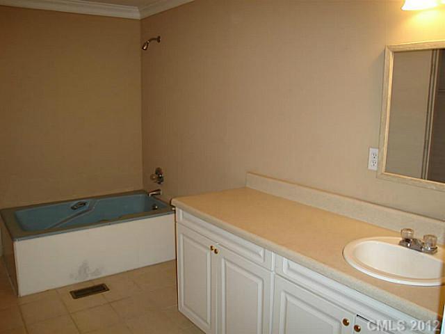275 Frontier Road Clover, SC 29710 - Photo 12 of 12 a bathroom with a sink and a bathtub