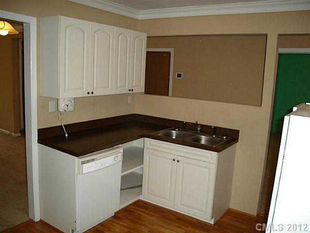 275 Frontier Road Clover, SC 29710 - Photo 5 of 12 a kitchen with a sink and cabinets