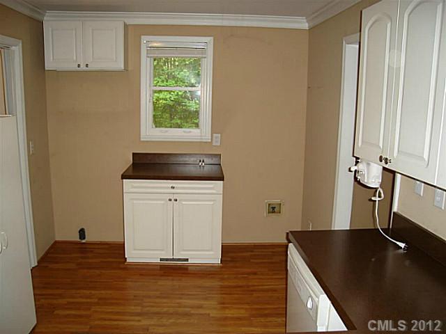 275 Frontier Road Clover, SC 29710 - Photo 6 of 12 a kitchen with a sink and cabinets