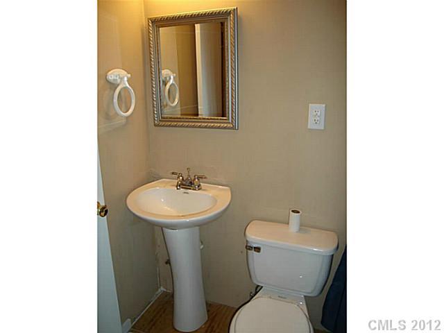 275 Frontier Road Clover, SC 29710 - Photo 10 of 12 a bathroom with a toilet sink and mirror