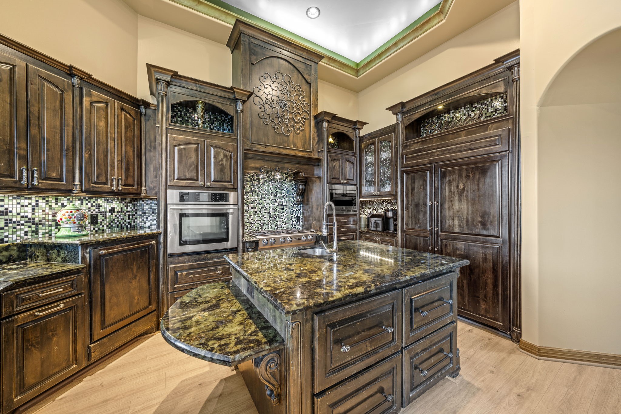 18732 Kz Road Cypress, TX 77433 - Photo 13 of 49 A vibrant and unforgettable space showcasing cabinet woodwork and a subzero fridge.