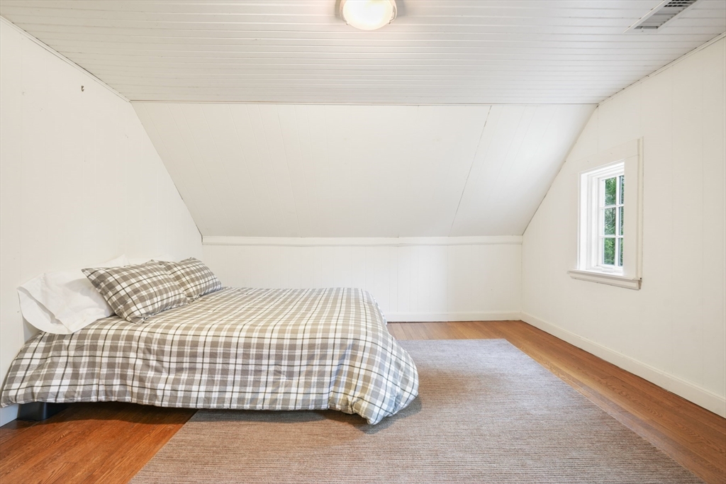 21 Alden Road Wellesley, MA 02481 - Photo 24 of 36 a bedroom with a bed and a window